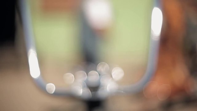 View of unusual steering wheel made of iron brass knuckles and handle. Summer sunny day. Vehicle. Exposition