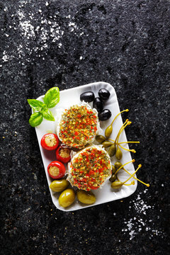 starter of green olives, black olives, capers, buffalo mozzarell