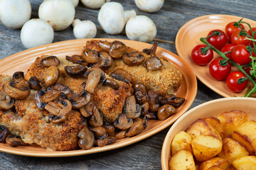 roulade of pork with roasted mushrooms and potatoes