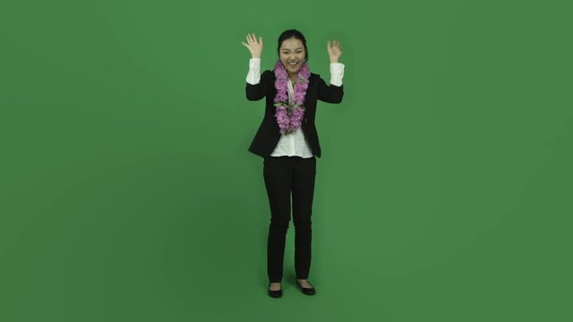 Asian business woman isolated greenscreen green background garland happy dance