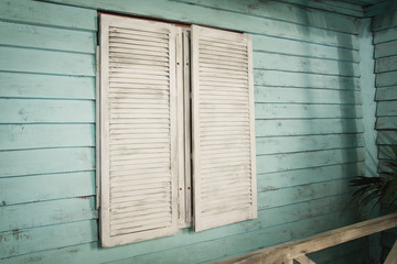 Window in a palm bungalow