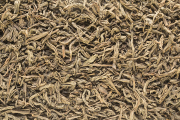 Background from dried leaves of Ceylon black tea close up