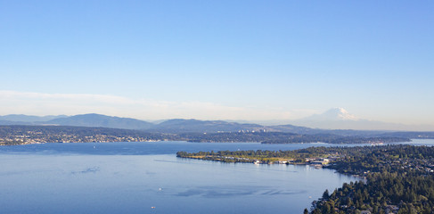 Aerial Shot of Forests, Lake, and Suburban Neighborhoods of Shoreline, Sand Point, North Seattle, Magnuson Park, Lake Washington, and Mt Rainier