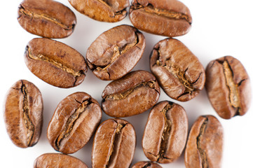 Roasted coffee beans isolated in white background cutout