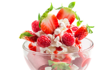 Dessert with raspberry and strawberry ice cream on white background