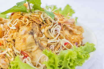Deep fried  ruby fish fried spicy with Thai Herb delicious Thai food.
