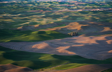 Washington Palouse. A spectacular sunset view from Steptoe Butte State Park of the surrounding farmland and small towns. From the top of the butte, the eye can see 200 miles.