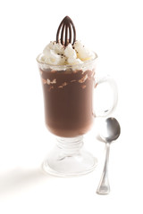 Iced coffee with whipped cream and sprinkles on a white background