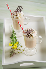Iced coffee with whipped cream and chocolate