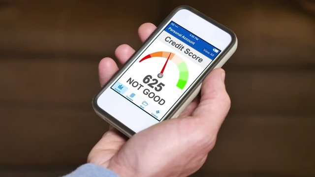 A man checks his FICO credit score on his smartphone. The result is not good. Fictional device and screen interface.	 	