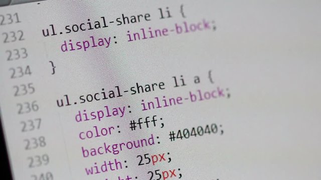 Light color scheme CSS Editor window, scrolling through cascading stylesheet. Screen shot under an angle, shallow DOF
