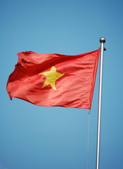 National flag of Vietnam on the sky background 