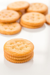 Salt cracker on isolated background with copy space.