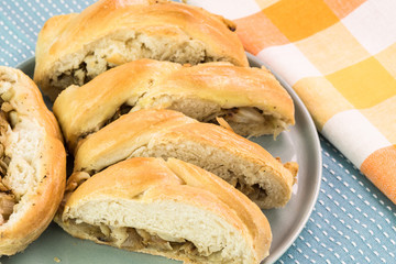Pieces of fresh baked delicious homemade cabbage mushroom pie.
