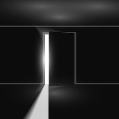 Open door with light on black background
