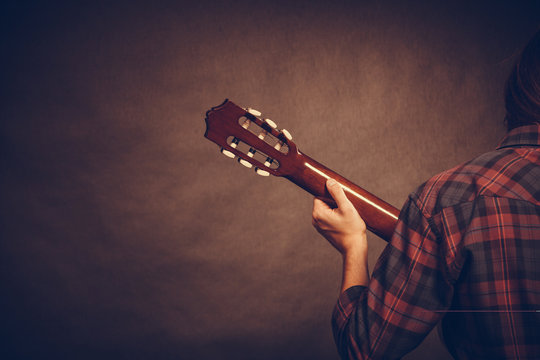 Rear view of young musican.