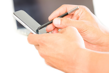 Close-up of using mobile phone