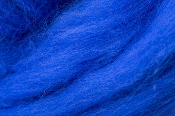 Текстура мериносовой шерсти синего цвета крупным планом
