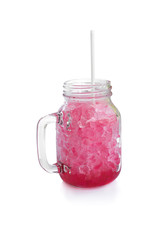 Red sweet water in glass jar with ice on white background