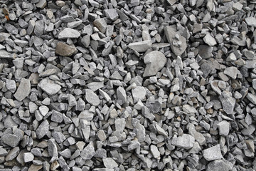 gray broken stone background (road metal)