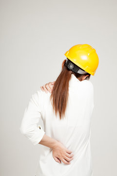 Back Of Asian Engineer Girl With Hard Hat Got Back Pain