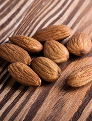 Almonds on a wood desk