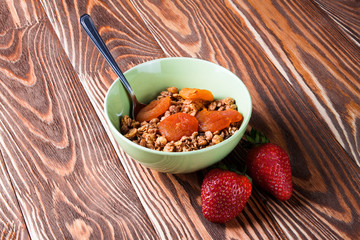Chocolate muesli in a transparent plate