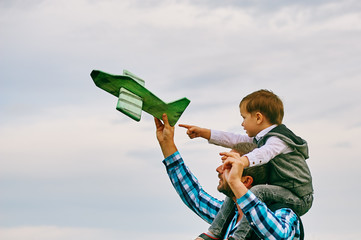 happy father with son playing with toy plane. dream to be a pilot © fisher05