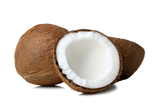 coconut cut into pieces on white isolated background