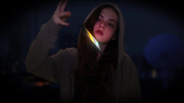 super power teenage girl levitate a smartphone