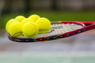 Tennis Balls on a Racket Close Up