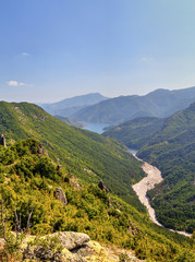 Fototapeta na wymiar Beautiful landscape with dam in the mountain