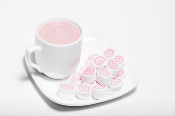 Fototapeta na wymiar Cup Of Coffee and pink marshmallow