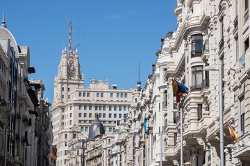 Fototapeta na wymiar Buildings situated on representative Gran Via street, Madrid (Spain)