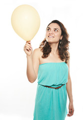 girl look at yellow balloon