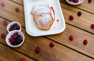 Delicious pancakes with raspberries, selective focus