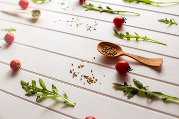 Fototapeta na wymiar Italian pasta ingredients on white wooden table, top view, copy space
