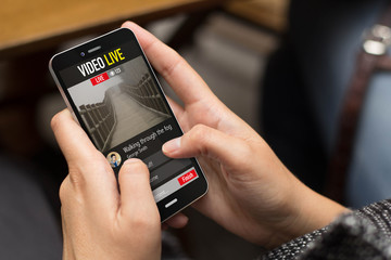 street girl watching a video live with a smartphone
