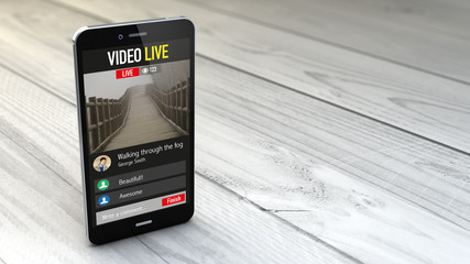 smartphone with video live application over white wooden backgro