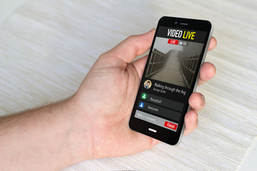 smartphone with live video application on the screen