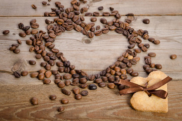 Frame- heart from coffee beans and two cookies-heart related tog