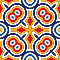 Bright ethnic abstract background. Seamless pattern with symmetric geometric ornament.