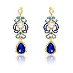 Pair of sapphire earrings isolated on white
