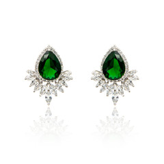 Pair of emerald earrings isolated on white
