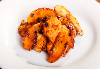 Turkey fillet with slices caramelized apple. Shot from above