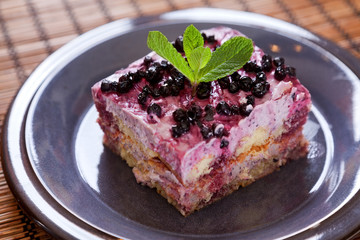 Italian Blueberry Tiramisu desert. Shot from above, horizontal view. One piece