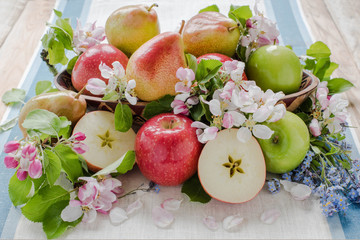 Apple and pears in spring bouquet, with flowers
