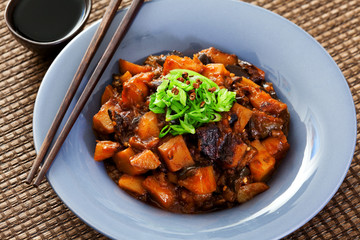 Asian vegetarian meal with potatoes and eggplants. Horizontal shot
