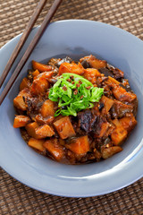 Asian vegetarian meal with potatoes and eggplants. Shot from above