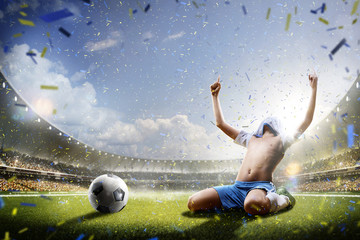 Fototapeta na wymiar Selebration of victory in children soccer match